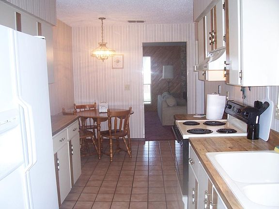 big galley kitchen, with breakfast or table nook
