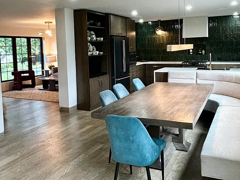 Oak wood floors are throughout main level and wall to wall tartan carpet in den!