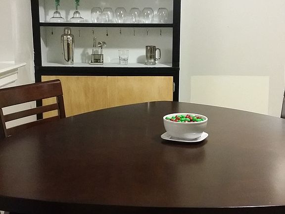 Kitchen w/ table & mini bar