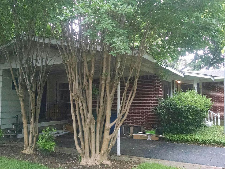 view of carport in front yard
