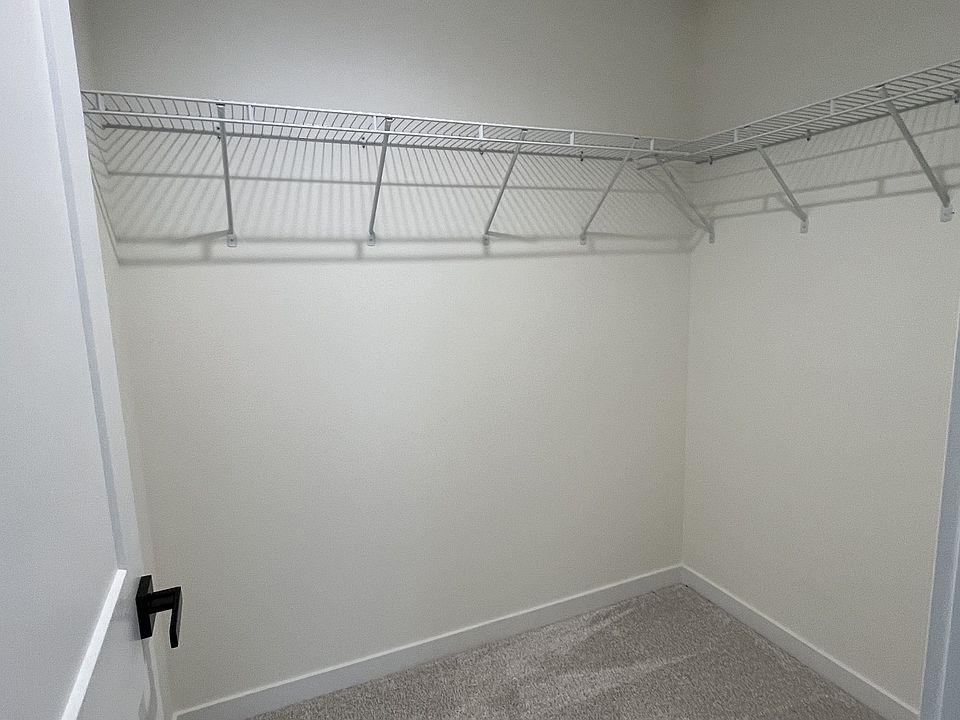 Primary bedroom with ample walk in closet