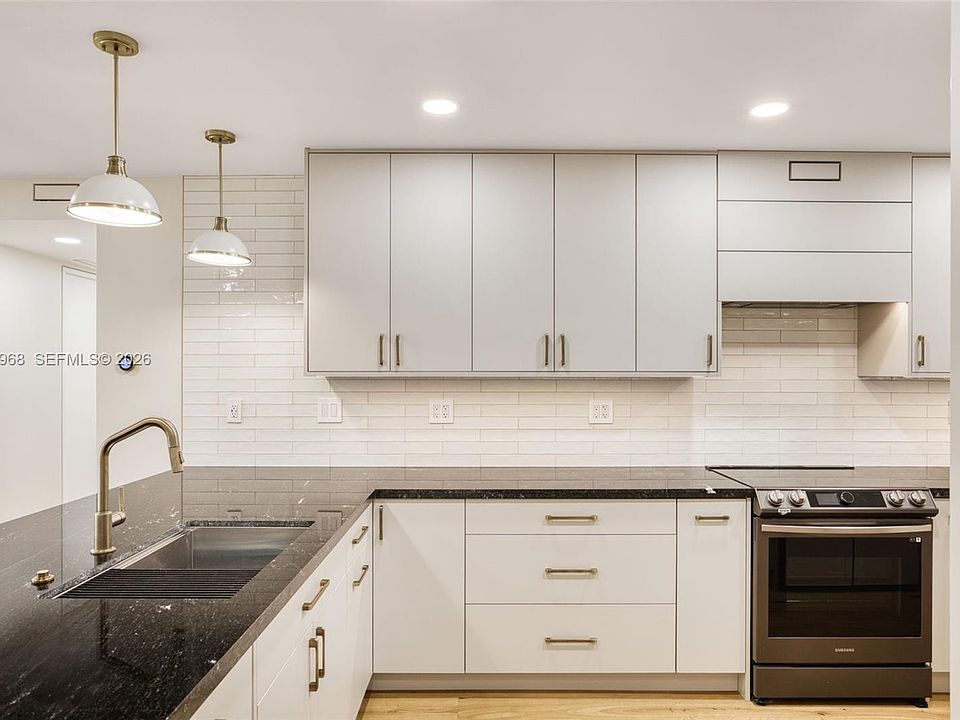 1st image of 100 Edgewater Dr APT 142