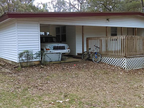 Rear View with large deck/utillty romm