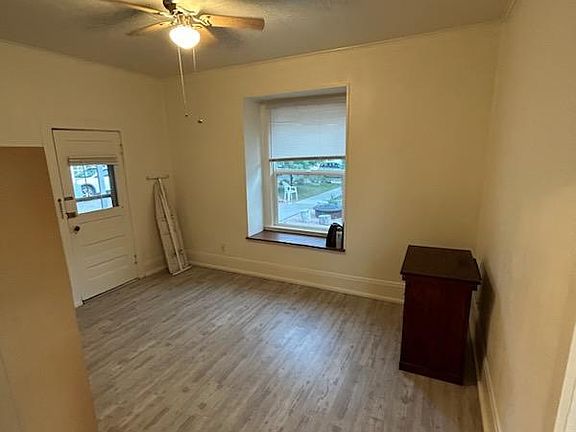 Living room view towards the front door