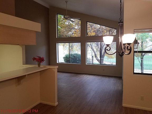 View from front door across dining room, living room. Great golf course views.