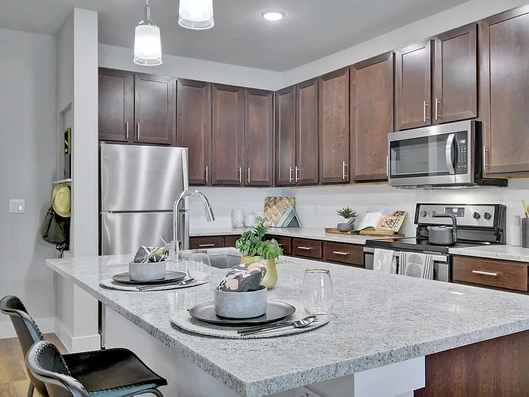 Select apartment homes feature kitchen islands.