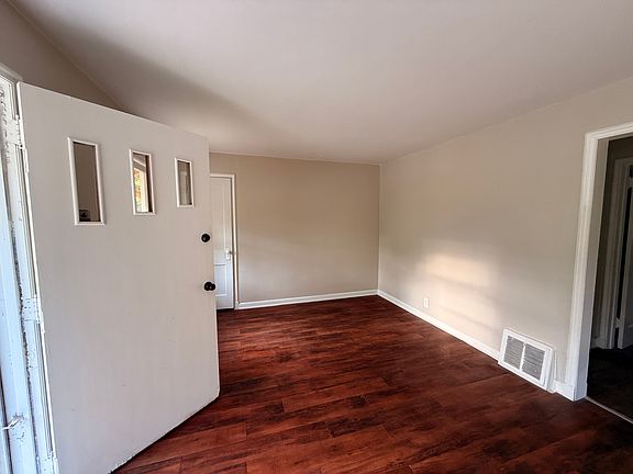 Entrance door into living room