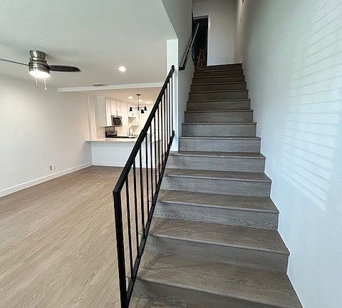 walking in front door to living area or up to bedrooms and full bath