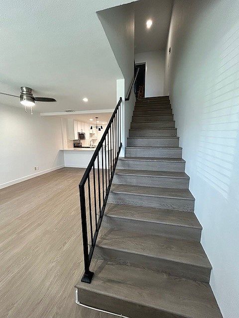 walking in front door to living area or up to bedrooms and full bath