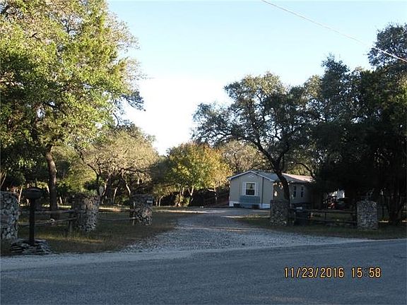 Back of the home faces Lonesome Trail.