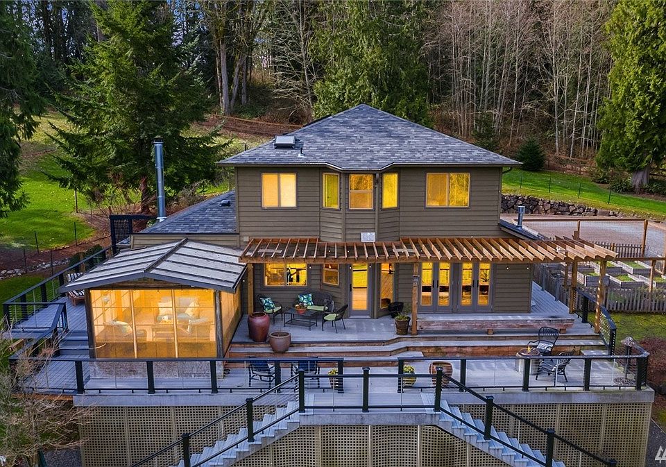 Enjoy your morning coffee watching the sun rise on this enormous east facing wrap-around deck.  