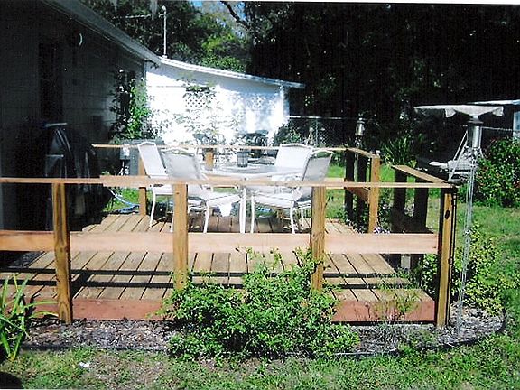 relaxing deck and inviting backyard
