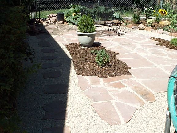 Side patio and flower garden.