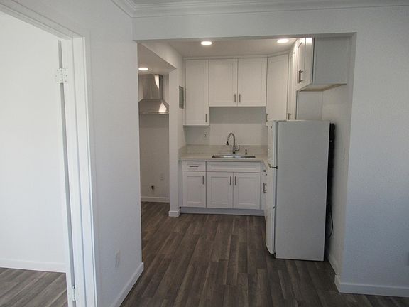 3rd image of 9744 Maple St Suite 201