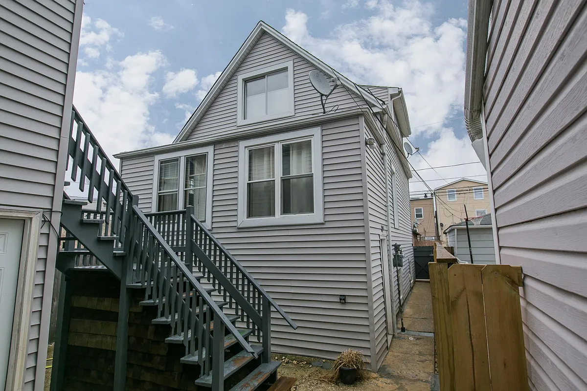 Front of coach house (rear of property). - 4217 N Bernard St #PRIVATE COACH HOUSE