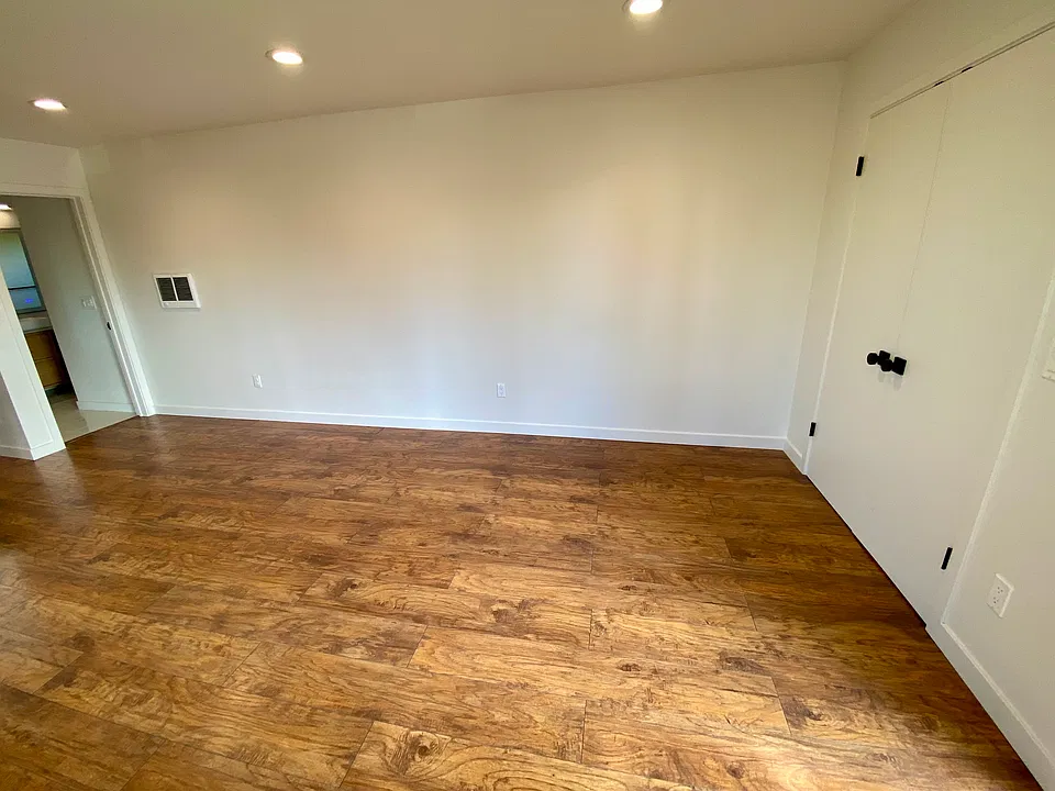 Bed area can fit Queen or King size bed with room to move. Great opportunity for a murphy bed, too.