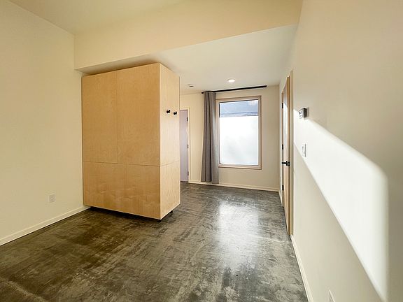 open bedroom separated from main living area