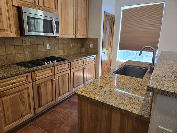 4th image of 8408 Wild Dunes Ave NW