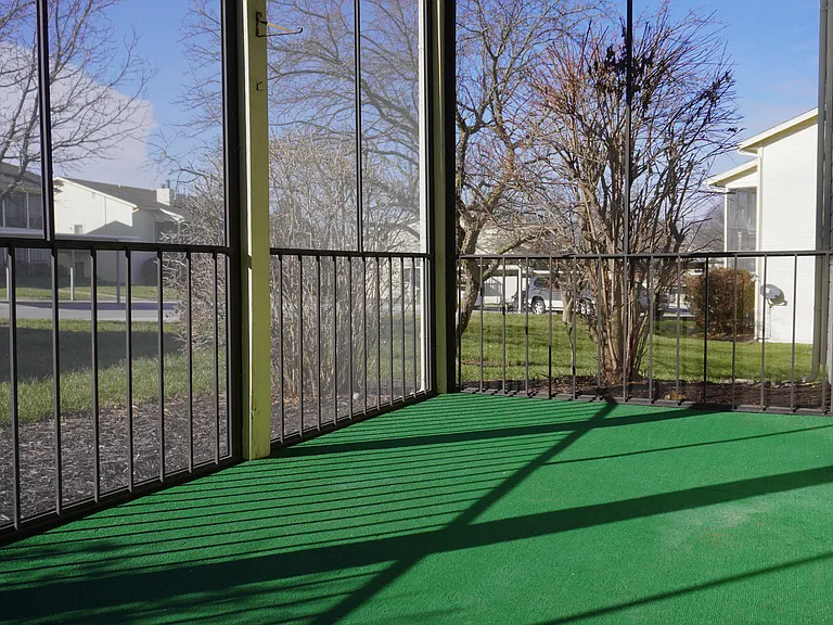 Relax and unwind on the large screened-in porch, located on the main unit level_perfect for year-round enjoyment.