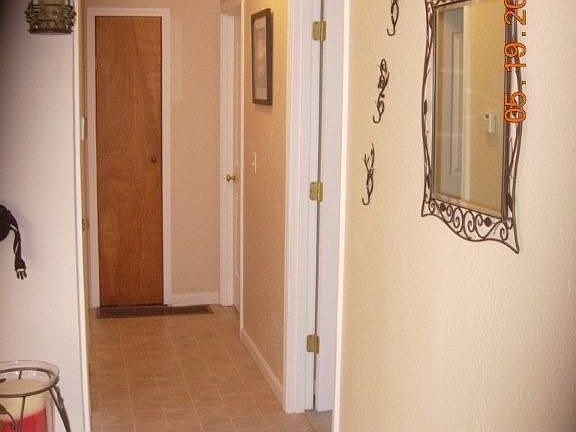 Hallway to bedrooms and main bath