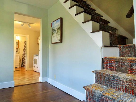 Lovingly remodeled, with new carpet runner on the stairs