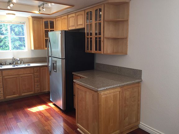 Kitchen with refrigerator included.