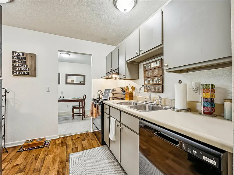 Experience convenience with a well-designed kitchen and open layout at University Hills Apartments near the University of Toledo.