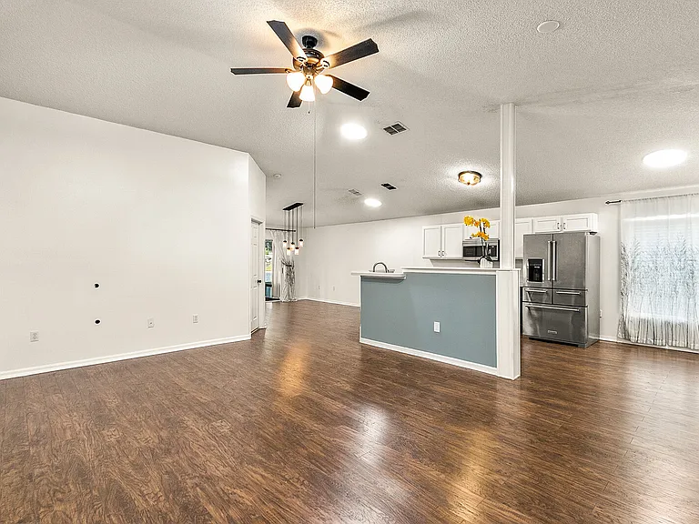 Kitchen & Dining View From Front Entry