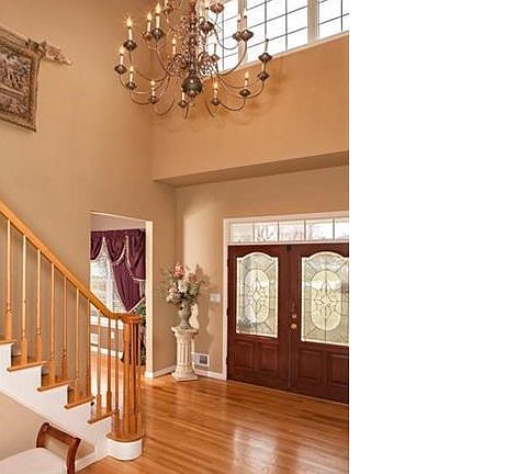 This dramatic two story entry greets all who enter.