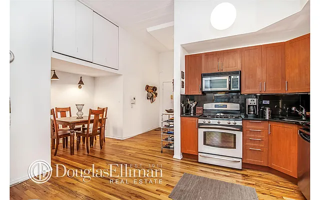 Sold by Douglas Elliman | media 12