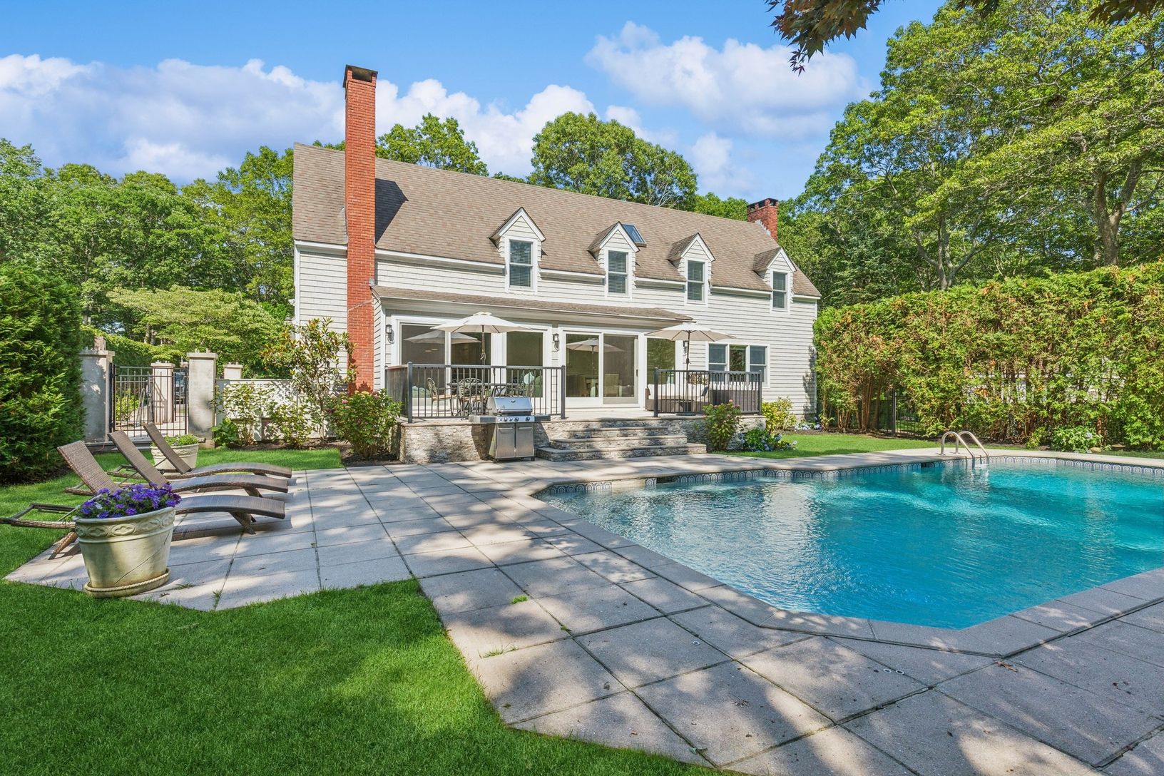  Pool, lounge area and back of house