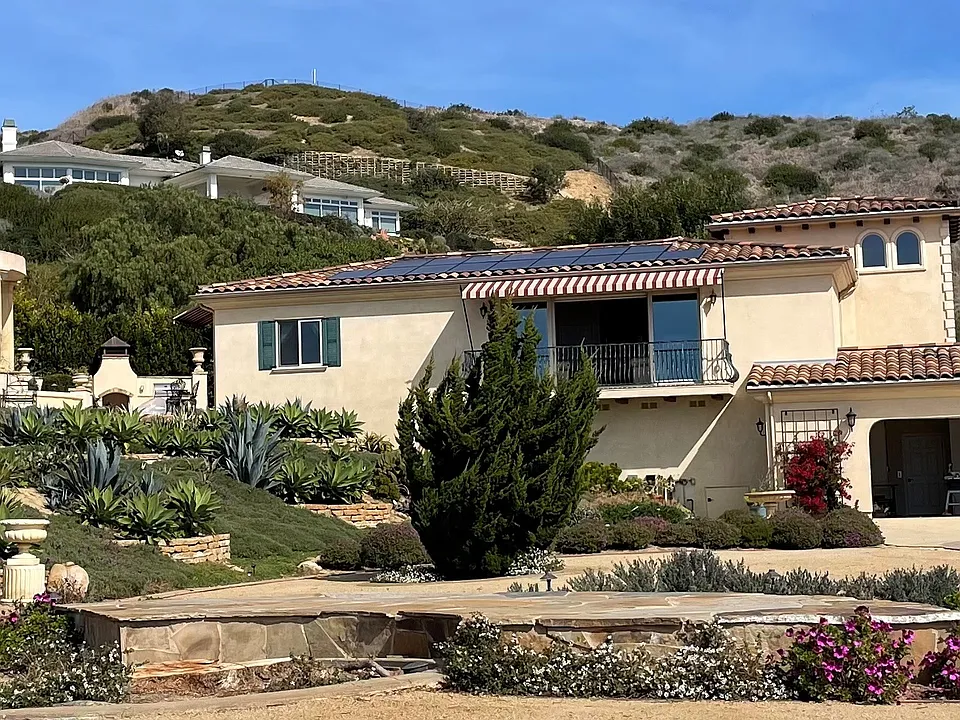 Garage-level view of the house