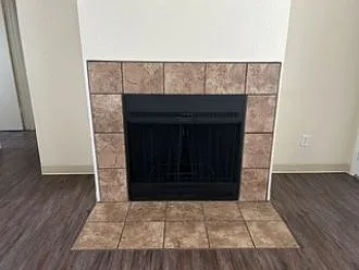 Wood-burning fireplace with designer tiles