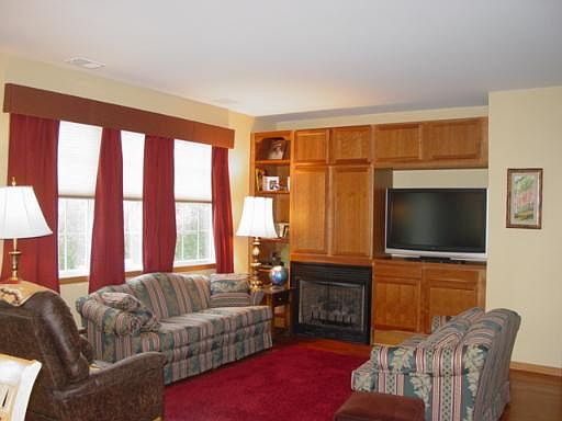 Family room with built-in entertainment center.
