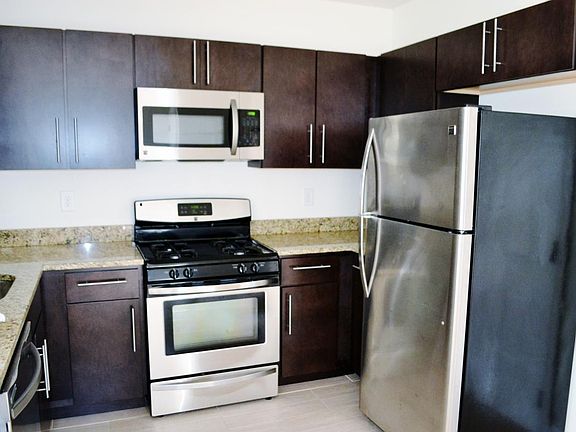 Kitchen features granite and stainless steel