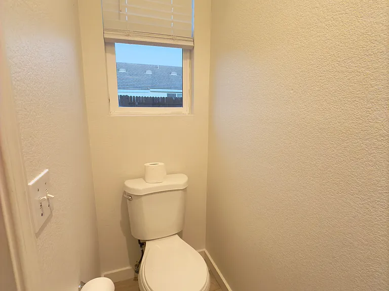 Private master toilet conveniently separated by a door for added privacy and functionality!