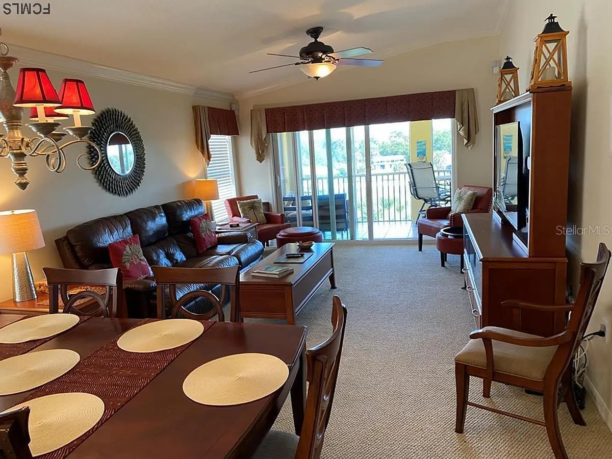 Large, combined dining and living space with room to entertain. - 700 Canopy Walk Ln #741