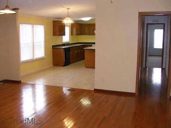 Dining w/ Hardwood Floors