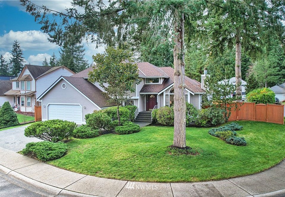 Welcome to a traditional, architecturally distinctive home with two-car garage and RV parking on a corner lot in a quiet neighborhood with sidewalks.  Tons of level walking in all directions!!