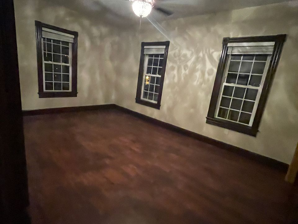 Master bedroom extra large deep custom closet & another small closet, fancy crystal ceiling fan, back up hard wired electric heat.