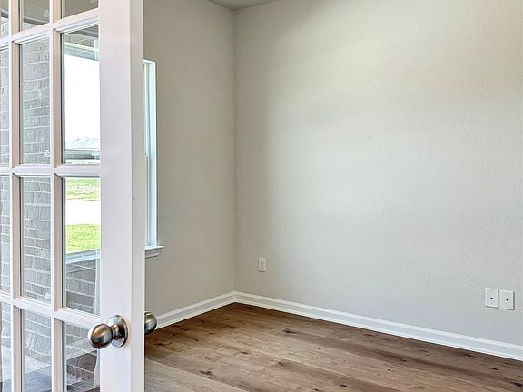 The Oakshire II- Study with French Doors.