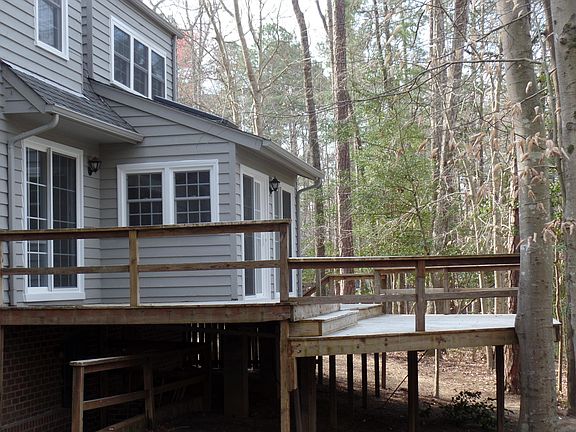 Rear deck area. All new Pella windows and sliding doors throughout.