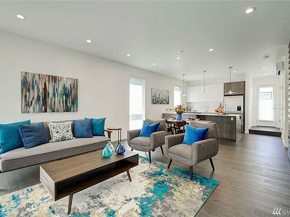 This spacious Great Room combines living, dining and kitchen areas in one - making entertaining a breeze!