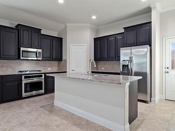 Photos shown here may not depict the specified home & features included are for illustration purposes only