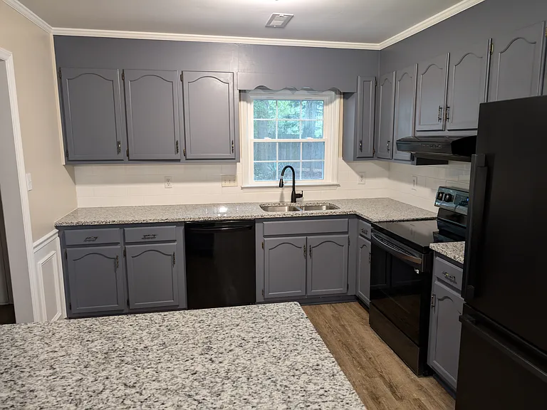 Kitchen with new dishwasher, fridge with ice maker and water dispenser in door