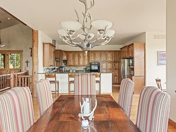 Enjoy festive dinners or game night at this beautiful dining room table.