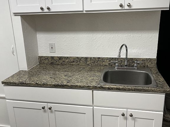 kitchen storage 
with new cabinet doors