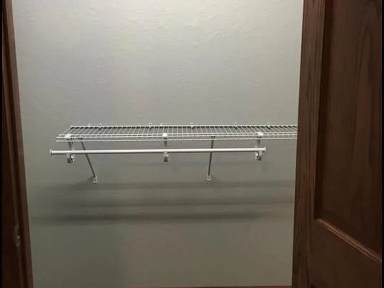 Downstairs bedroom walk-in closet