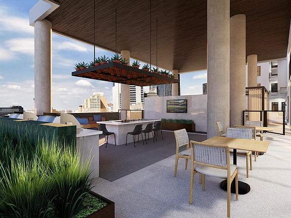 Poolside wrap-around covered amenity deck with grilling, TV wall, bar cooler table, fire table, and lounge seating.