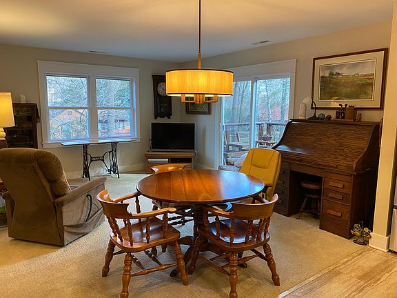 Living room with patio door to deck.